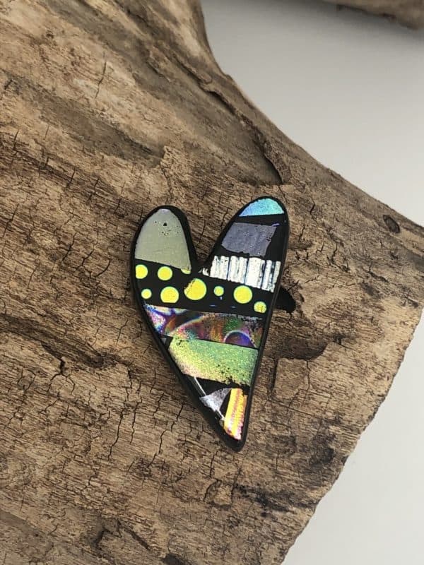 Heart shaped pin with stripes of dichroic glass in all different designs