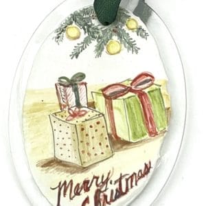 packages with Merry Christmas on an oval ornament