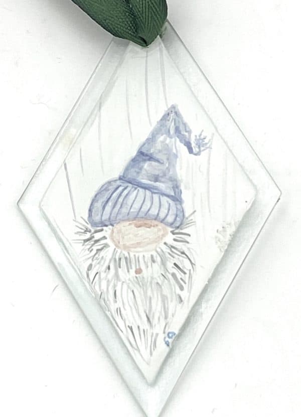 gnome head in light purple stocking cap
