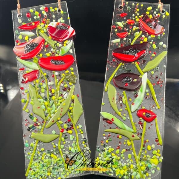 two 9x3" poppy themed glass flower sun catchers