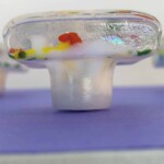 These custom pulls and handles were coordinated to go with custom floral tiles that I created in the backsplash pulls and handles